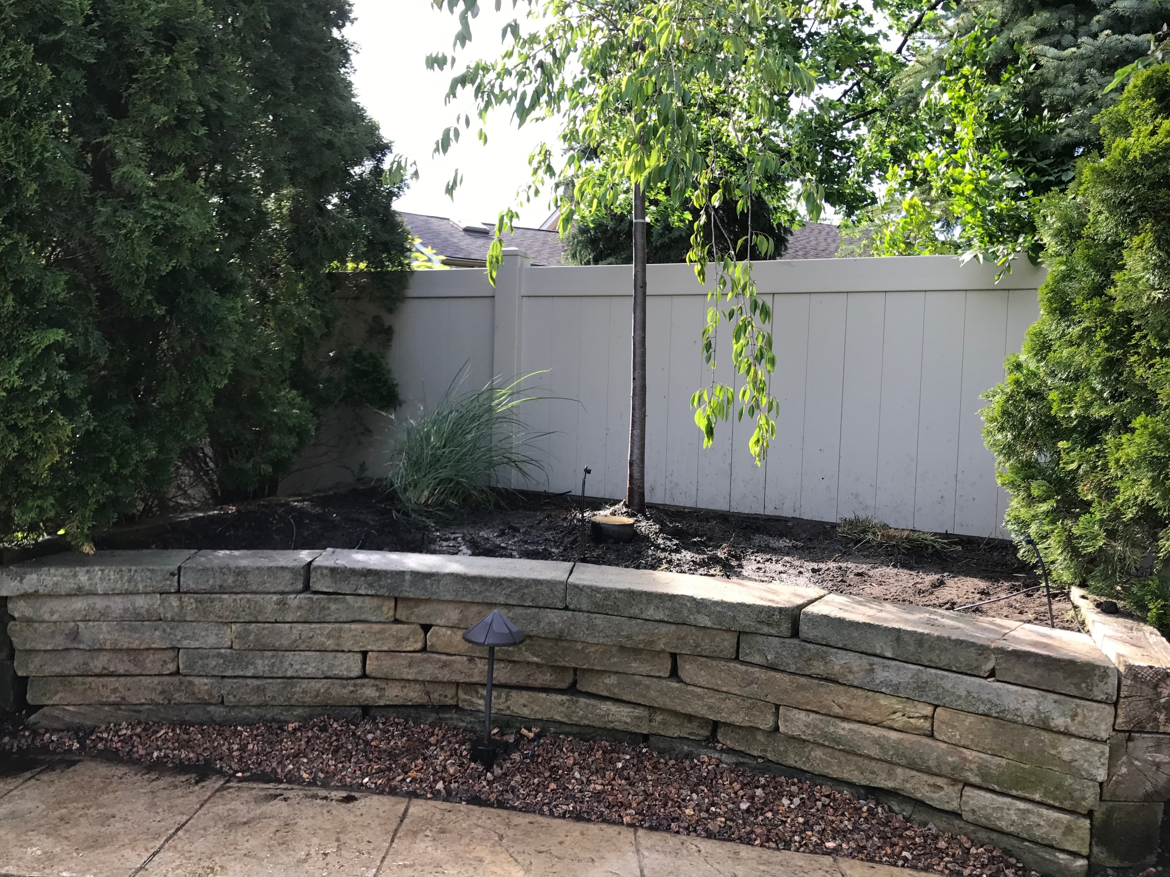 Stone Garden Bed Wall Installation