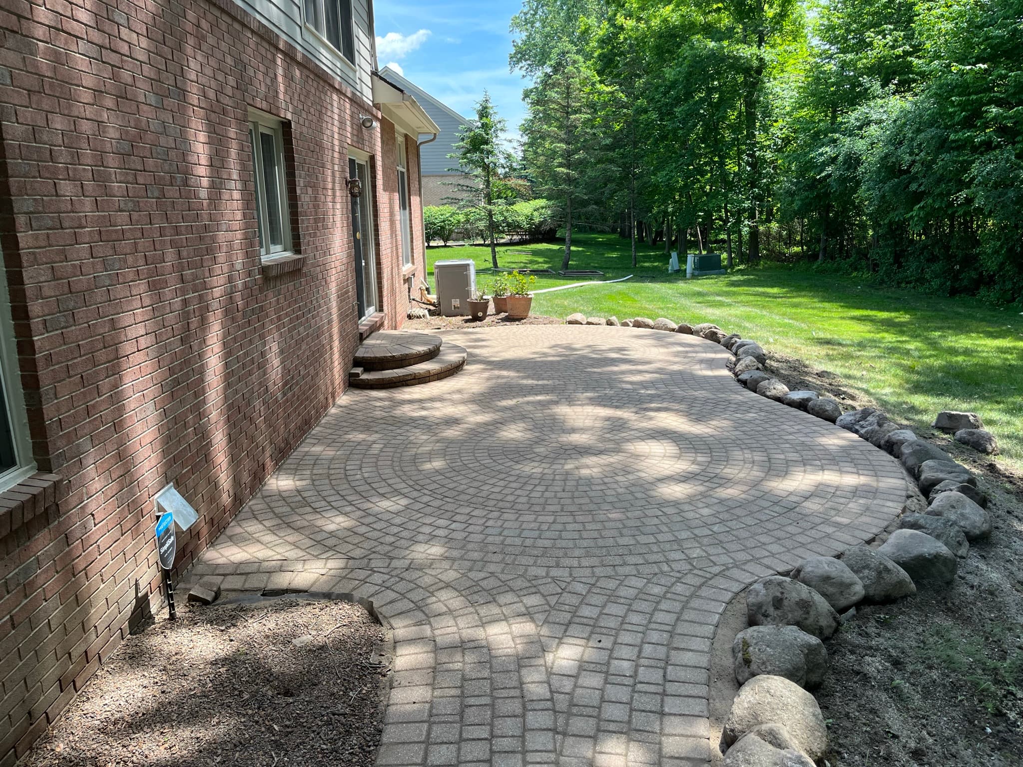 Brick Paver Patio with Stone Border